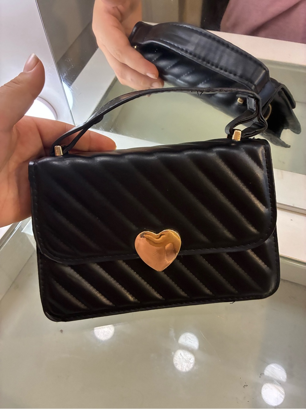 Black small clutch heart with gold hardware